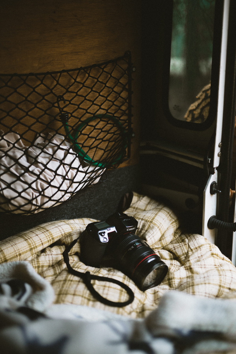 vehicle interior, camera - Photographic Equipment, close-up, day, no people, car interior, window, dslr, travel, tourist, indoors, mode of transportation