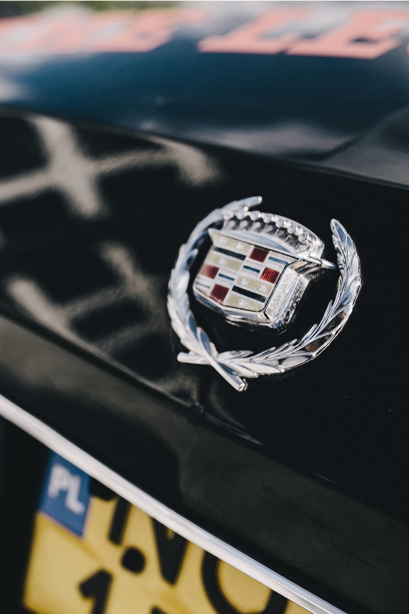car, close, vintage, 2K, ball, luxury, black, outdoors, focus on foreground, sports equipment, day, sport, old, car interior, american, retro, closeup