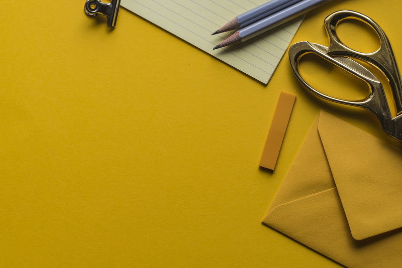 copy space, gray, paper, near, studio shot, high angle view, blank, group of objects, yellow background, scissors, yellow, directly above, table, two, pen
