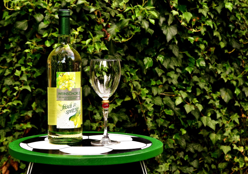 hand painted, alcohol, alcoholic, focus on foreground, beverages, small table, leaf, victory, celebration, creative, wineglass, drink, food and drink, day
