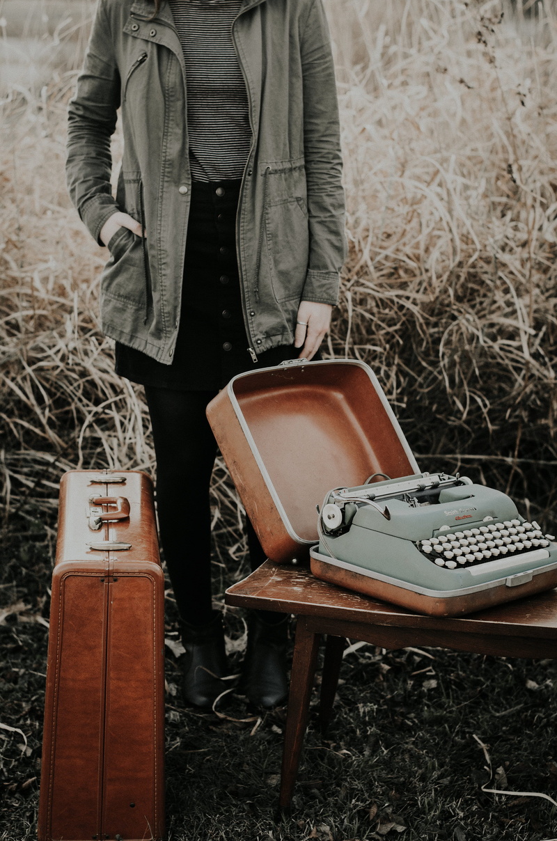 old, 2K, land, one person, color, suit, person, lifestyles, brown, midsection, nature, casual clothing, holding, selective, men, field, typewriter, wooden