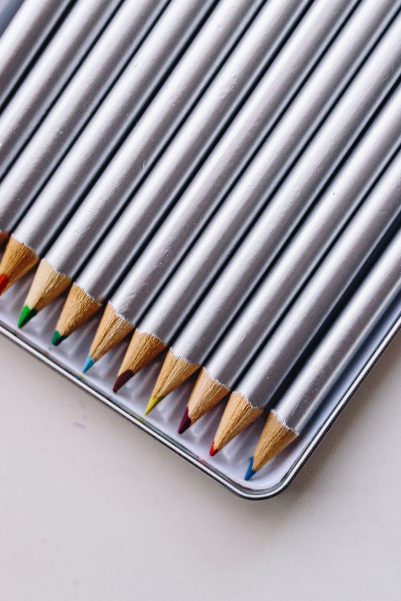 blue, indoors, studio shot, art and craft, choice, pencil, drawing, case, colored pencil, white, backgrounds, in a box, pattern, high angle view, close-up