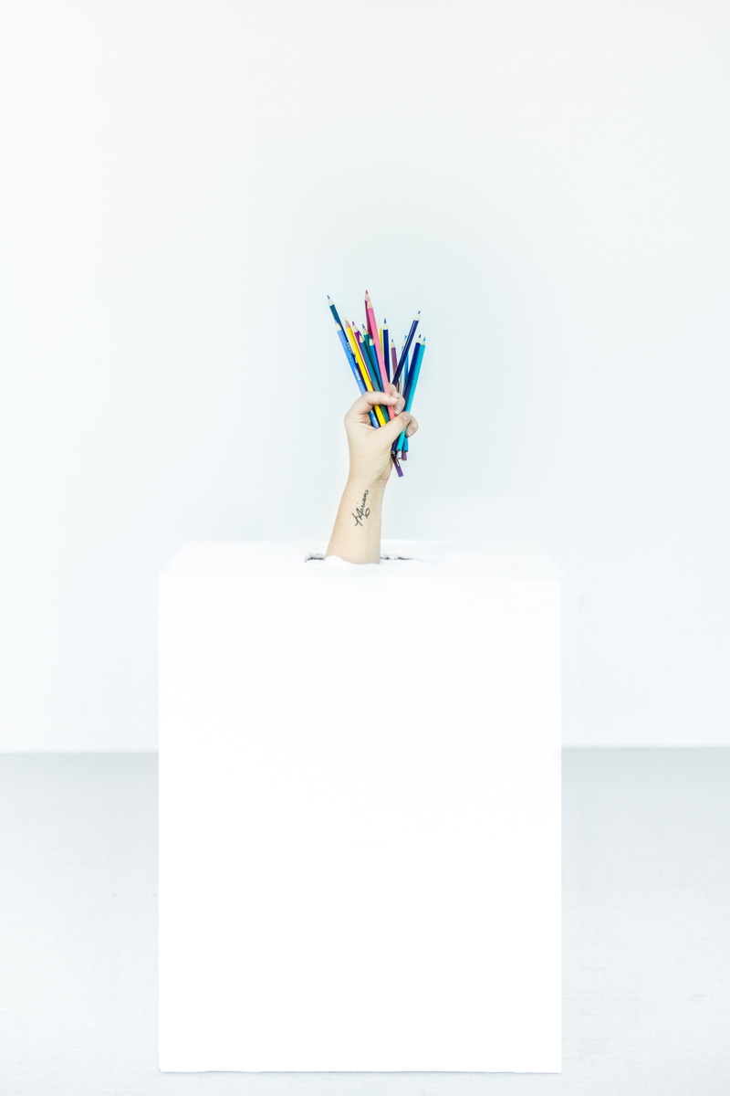 writing instrument, pencil, art and craft, office supply, table, office, creativity, indoors, studio shot, hand, multi colored, colored pencil, white color