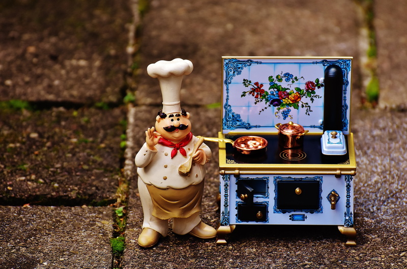 pan, pot, doll, outdoors, male likeness, kitchen, suitcase, stuffed toy, human representation, 5K, gourmet, small, representation, robot, cooking, figure