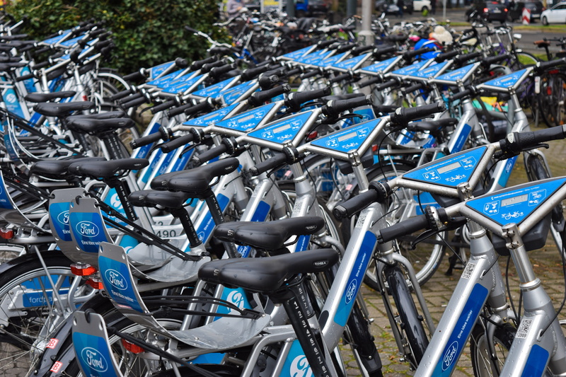 mode of transportation, leisure, bicycle, side by side, movement, wheels, close-up, focus on foreground, bicycle hire, outdoors, silver colored, series