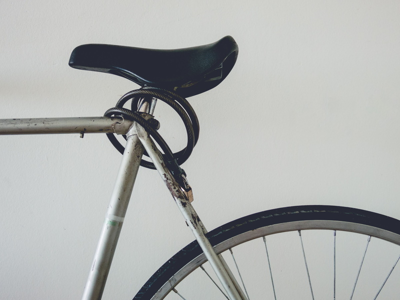 mode of transportation, stationary, gray, close-up, black, copy space, low angle view, no people, spoke, bike, land vehicle, basket, cable, handlebar, tire