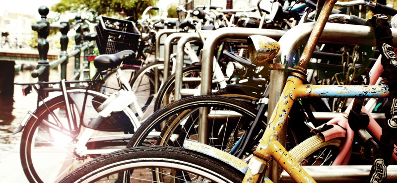 stationary, mode of Transport, bicycle rack, bicycle, city, land vehicle, metal, cycle, bike, bicycles, fence, architecture, street, beside, wheel, handlebar