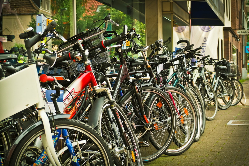 outdoors, nature, cyclists, parking lot, store, retail store, no people, center, architecture, shop, mode of transportation, wheel, bicycle rack, 4K, city