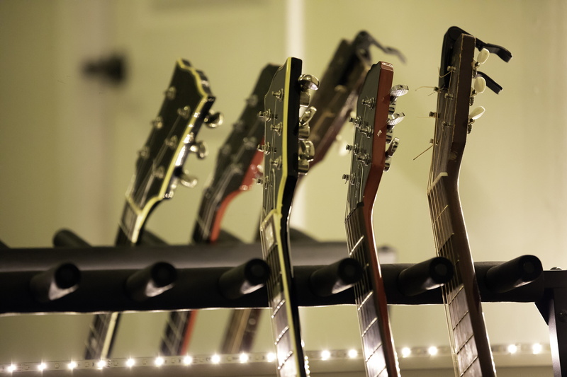 rack, musical instrument, alloy, music, lights, 5K, arts culture and entertainment, metal, group of objects, wall - building feature, no people, indoors