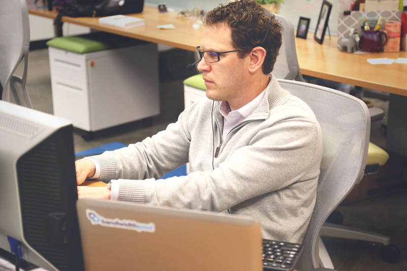 company, one person, busy, office, business, using laptop, coding, work space, wireless technology, waist up, real people, 4K, young adult, man, concentration