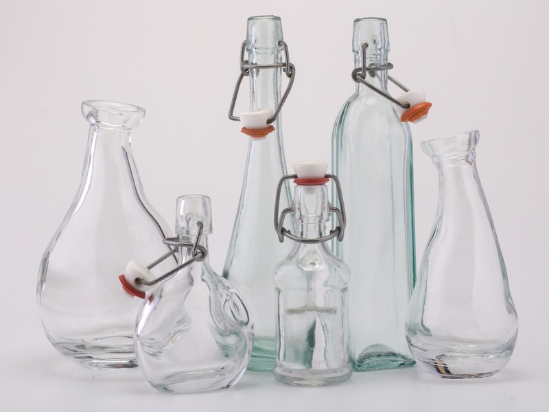 transparent, close-up, group of objects, glass, carafe, table, bottle, empty, food, white background, liquid, light reflections, food and drink, no people