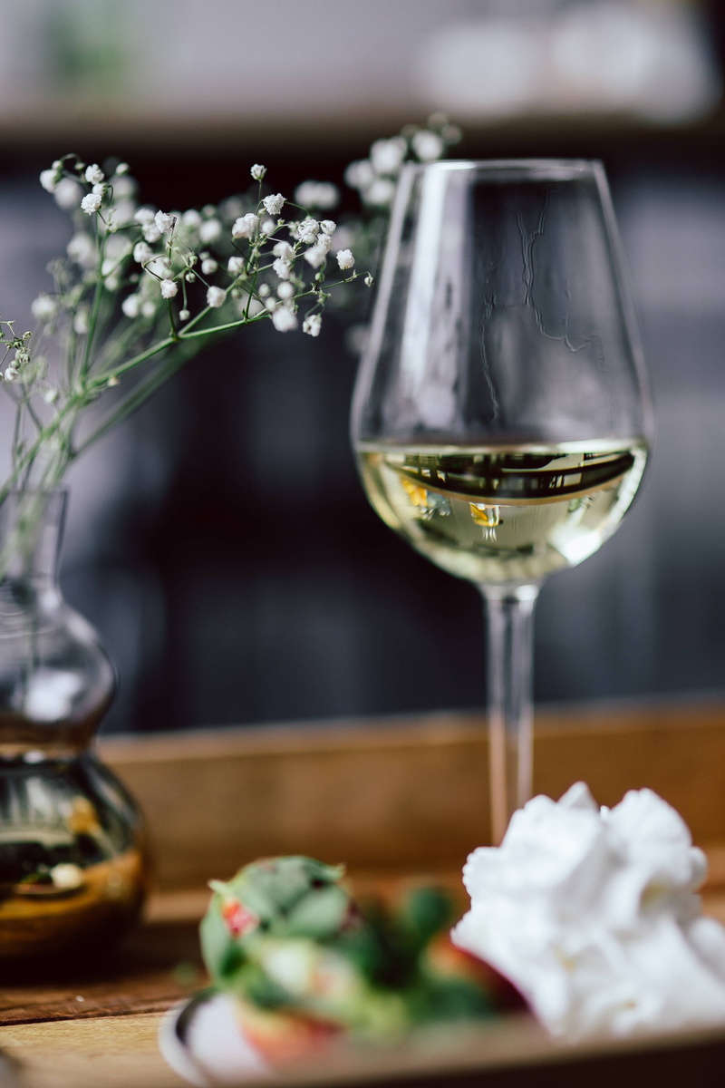 food, white wine, still life, indoors, restaurant, selective focus, glass - Material, close-up, whipped cream, plant, wooden, table, focus on foreground