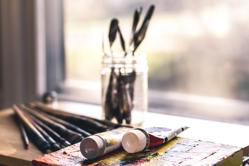 colors, white, glass jar, indoors, glass - material, tube, refreshment, bottle, art, two, day, window, paintbrush, brush, palette, still life, no people