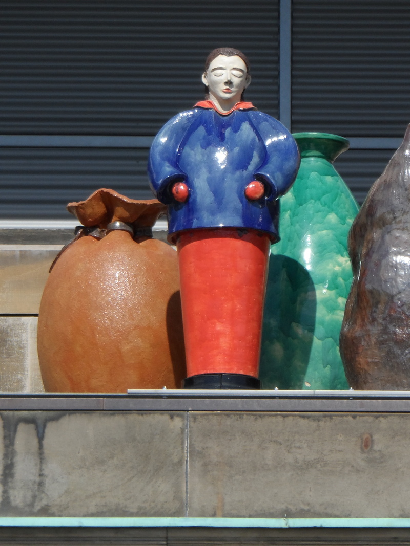 artwork, human representation, immigrate, emigration, casual clothing, low angle view, artists, representation, figurine, plastic, outside art, art and craft