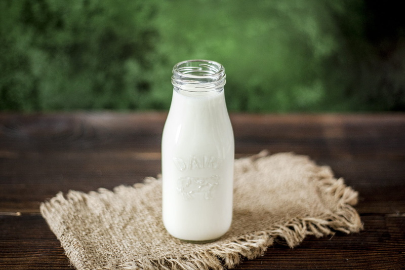 indoors, focus on foreground, pitcher - jug, wood - material, food and drink, purity, milk, glass, healthy lifestyle, nature, dairy product, wellbeing
