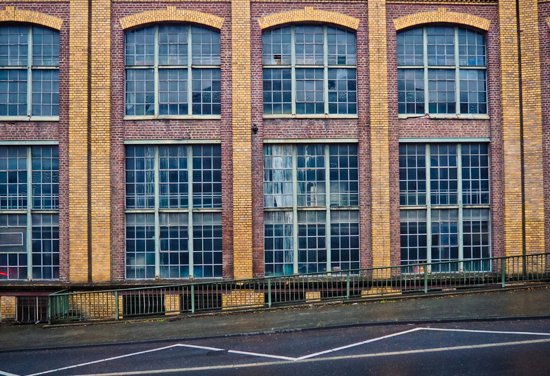 road, empty, window, past, industrial building, factory building, day, 4K, transportation, marking, full frame, no people, factory, glass - material, in a row