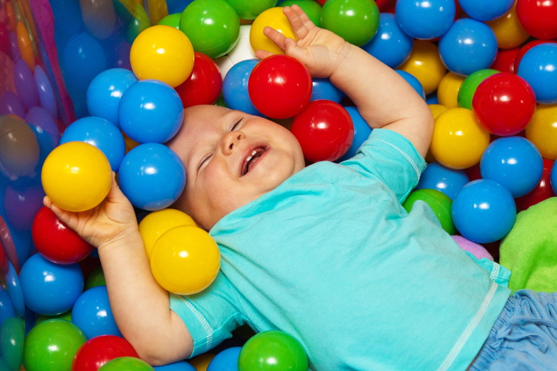 cute, blue, large group of objects, color, child, baby, happiness, fun, little, play, cheerful, young, emotion, balloon, one person, enjoyment, ball, shirt