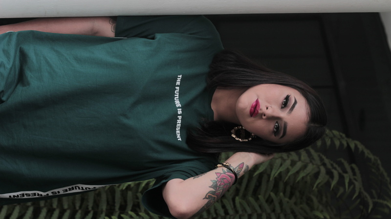 long sleeve, clothing, waist up, wrist, female, apparel, shirt, finger, dj, young adult, lying down, face, beauty, tattoo, photo, front view, crew, furniture