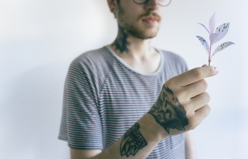 indoors, facial hair, arm, adult, man, art and craft, young adult, striped, holding, looking, 5K, human Hand, human body part, wearing, tattoos, beard