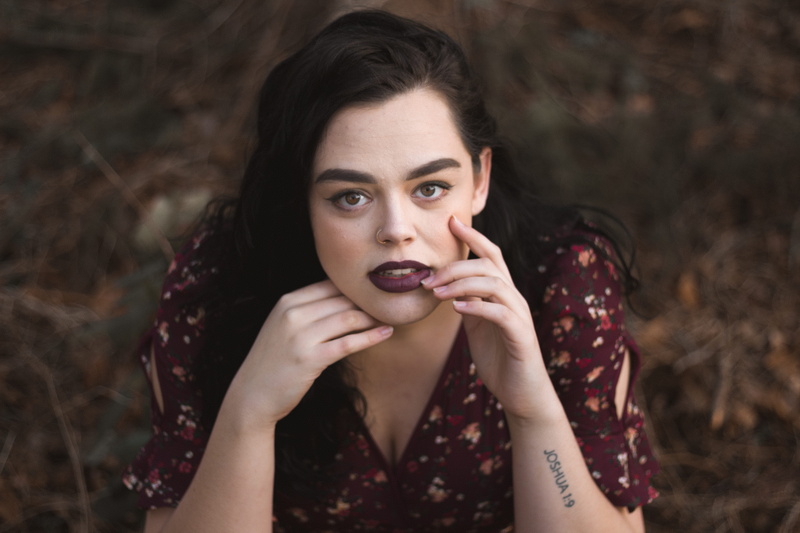 adult, apparel, smile, finger, young adult, clothing, lip, contemplation, face, women, photography, hand, wrist, girl, photo, hairstyle, female, dress