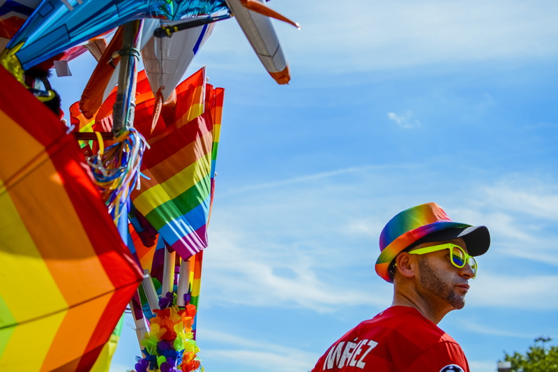 accessories, festival, kite, hat, france, clothing, apparel, human, outdoors, toy, portrait, cloud - sky, one person, crowd, men, focus on foreground, real people