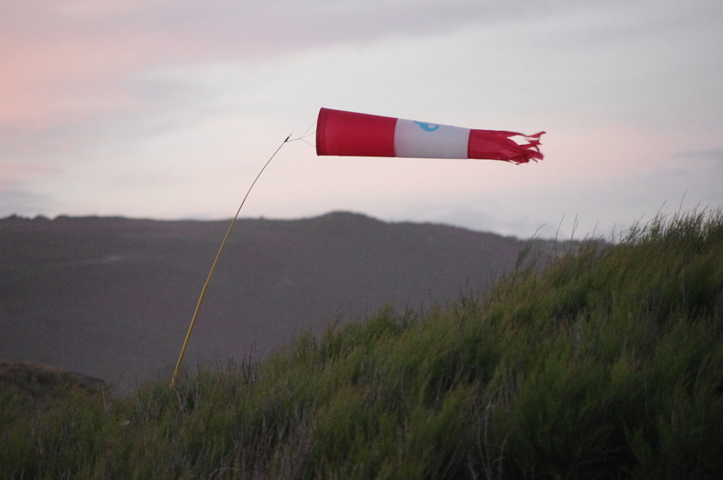 sport, land, freedom, flag, sky, patriotism, nature, red, plant, day, no people, flying, wind, outdoors, kite - toy, windsock, cloud - sky, mid-air, environment