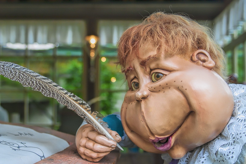 people, offspring, draughtsmanship, 2K, signs, pop, focus on foreground, outdoors, efteling, holding, to write, hairstyle, males, portrait, headshot, close-up