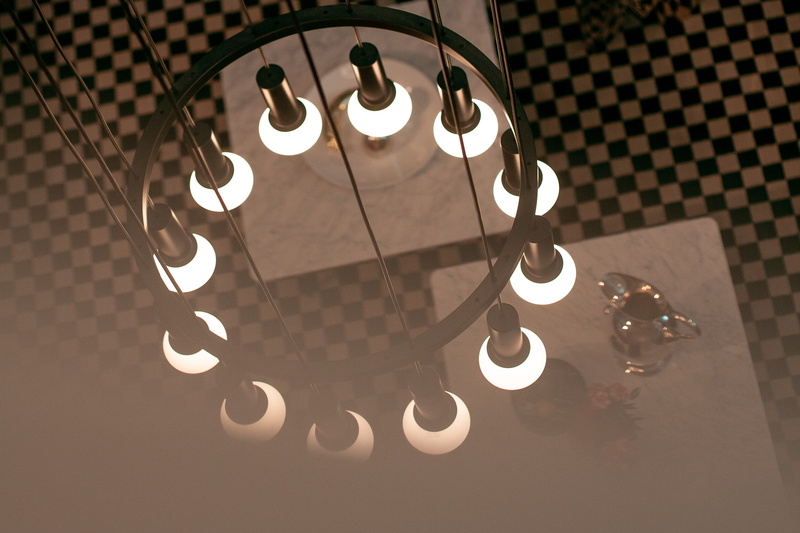 illuminated, glowing, close-up, still life, vitra design museum, no people, light - natural phenomenon, high angle view, light, shadow, flooring, table