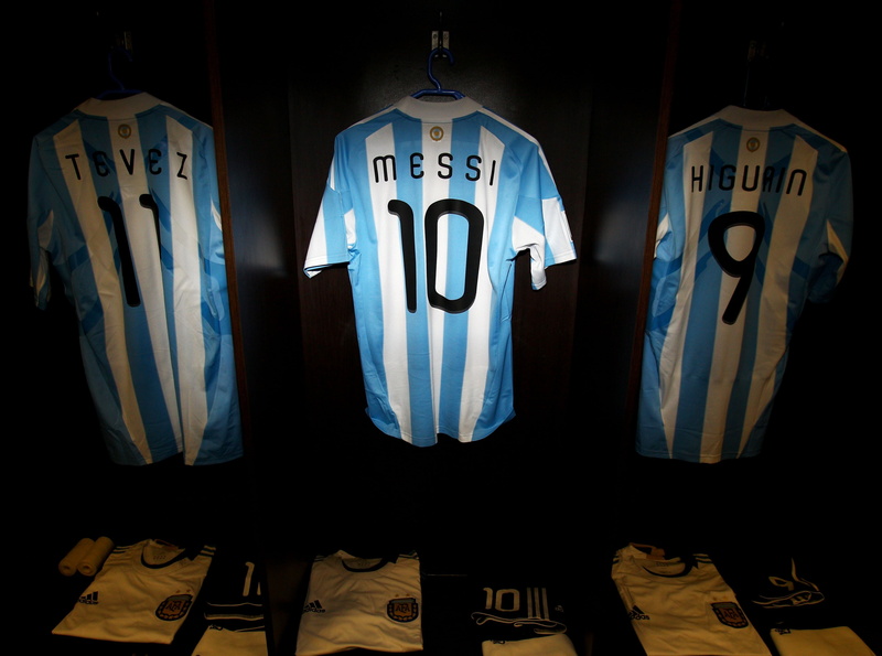 blue, Argentina, white color, Shirts, Team, indoors, day, western script, striped, sports uniform, no people, hanging, black background, panoramic, sport