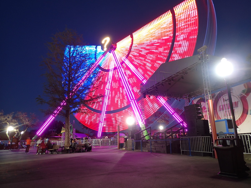 illuminated, incidental people, sky, outdoors, fun, city, purple, street, architecture, amusement park, nature, motion, building exterior, six flags over texas