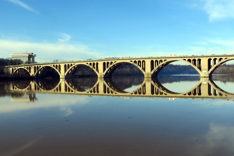 arch, river, blue, cloud - sky, connection, rosslyn, bridge - Man Made Structure, architecture, arch bridge, famous Place, nature, in a row, potomac, concrete