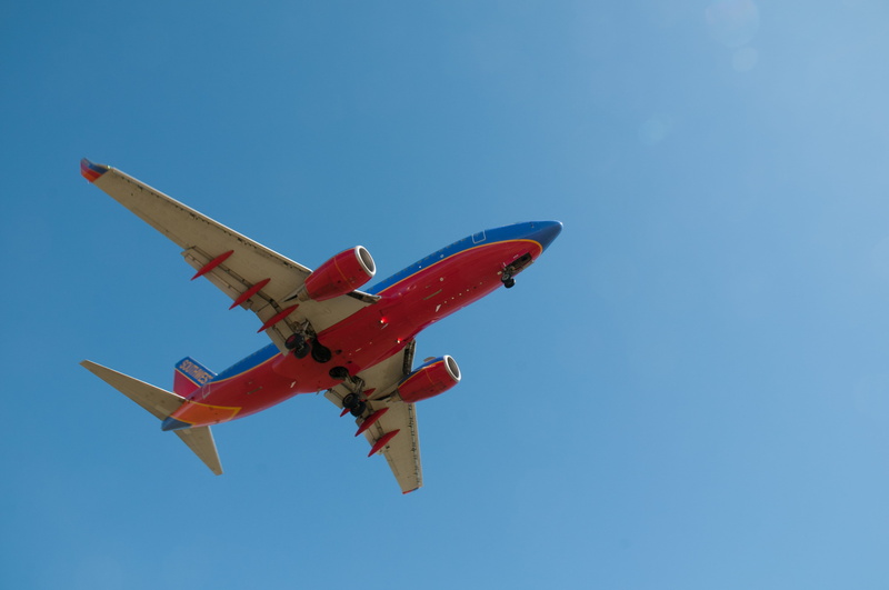 clear sky, airplane, outdoors, no people, journey, plane, above, aerobatics, travel, air vehicle, airliner, aerospace industry, blue, motion, nature, on the move
