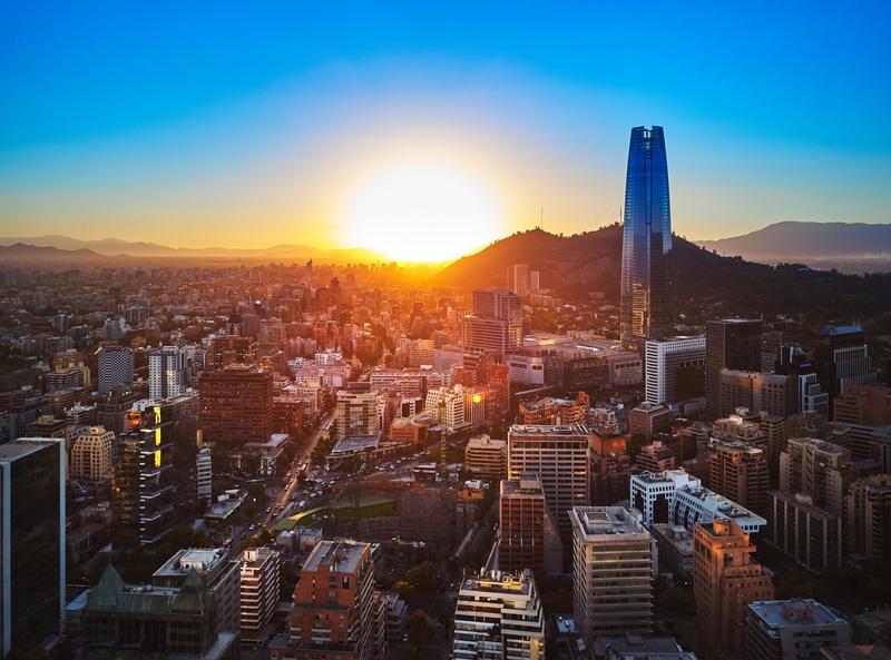 lens flare, architecture, Chile, urban skyline, sunset, building exterior, South America, travel destinations, building, sunlight, no people, skyscraper