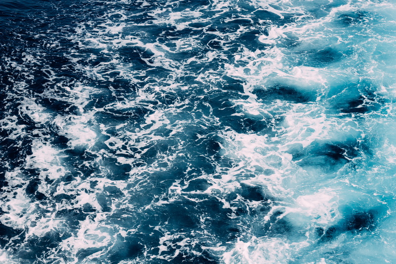body, aquatic sport, weather, flowing, wet, water, outdoors, rippled, summer, splashing, day, waves, beauty in nature, blue, liquid, high angle view, motion