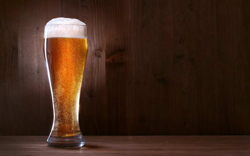 bar counter, cold temperature, beer, glass, household equipment, frothy drink, beer glass, beer - alcohol, indoors, alcohol, table, drink, no people, wood - material
