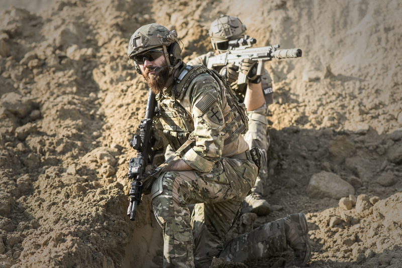 gunshow, camouflage clothing, nature, holding, sport, 5K, security, group, armed forces, military uniform, action, army, conflict, rifle, sand, suit, weapon