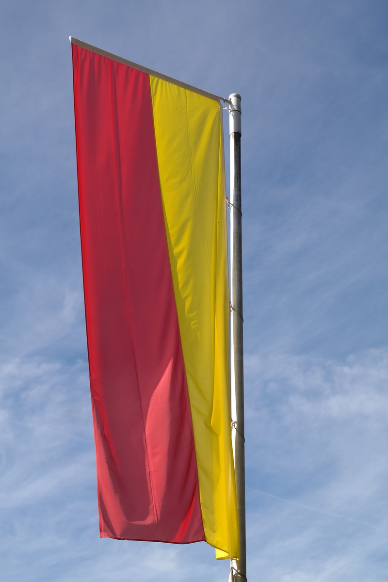 low angle view, pole, wind, textile, environment, striped, Swabia, no people, day, emotion, swabia bavaria flag, flag of swabia bavaria, nature, Yellow