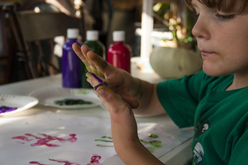 artwork, child inspiration, childhood, art and craft, creativity, focus on foreground, one person, looking, painting, casual clothing, close-up, messy