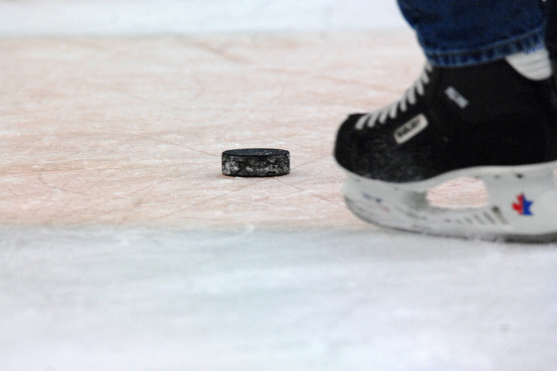 winter sport, arena, leisure activity, adult, one person, hockey puck, shoe, 2K, person, winter, selective focus, skating, body part, sports, playing