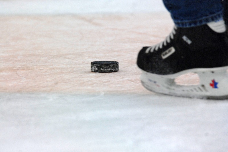 body part, shoe, human limb, winter, sport, limb, human foot, low section, adult, lifestyles, standing, hockey, winter sport, puck, cold temperature, ice