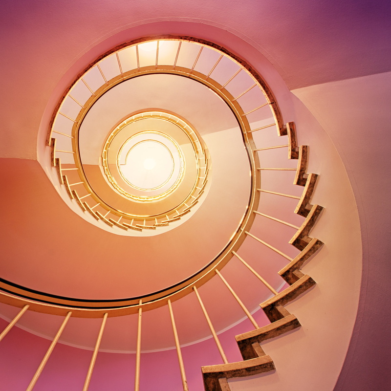 2K, pattern, curve, directly below, lights, railing, lighting, built structure, architecture, diminishing perspective, golden light, spiral staircase