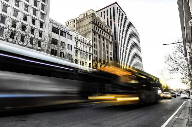 traffic, mode of transportation, white, cityscape, street, outdoors, urban Scene, public transportation, day, time, land vehicle, passing, built Structure