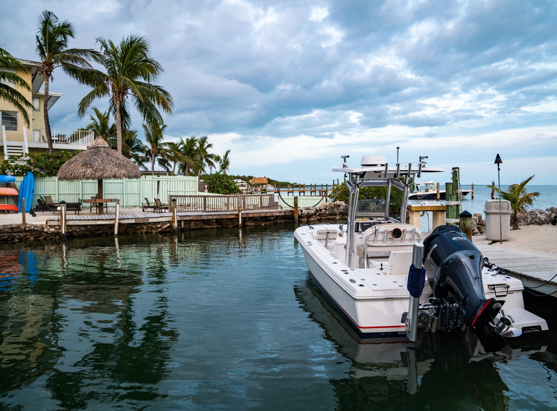 nautical vessel, beach, palm tree, tropical climate, plant, islamorada, outdoors, nature, building exterior, florida, boats, key west, waterfront, transportation