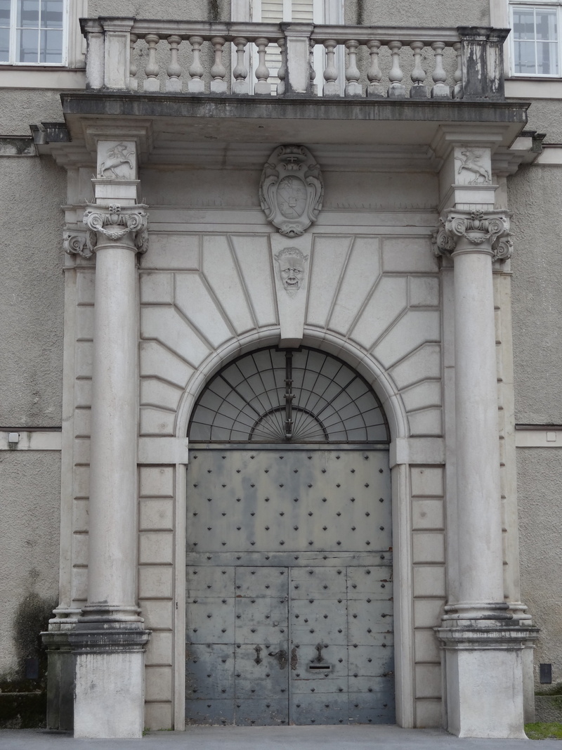 day, architectural column, house, exterior, the past, artsy, door, stone, ornamental, ancient, wall, city, closed, concrete, ornate, front, outdoor, baroque