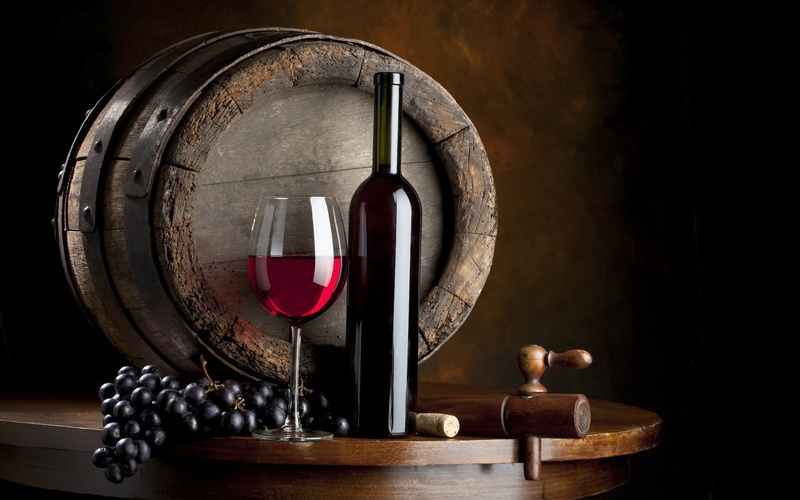 winemaking, wine cellar, table, red wine, glass - material, glass, bottle, food and drink, corkscrew, drink, no people, indoors, barrel, luxury, still life