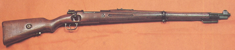 wood - material, corkscrew, sign, weapon, selective focus, single object, mauser k98 rifle, no people, security, metal, aggression, 8K, close-up, copy space