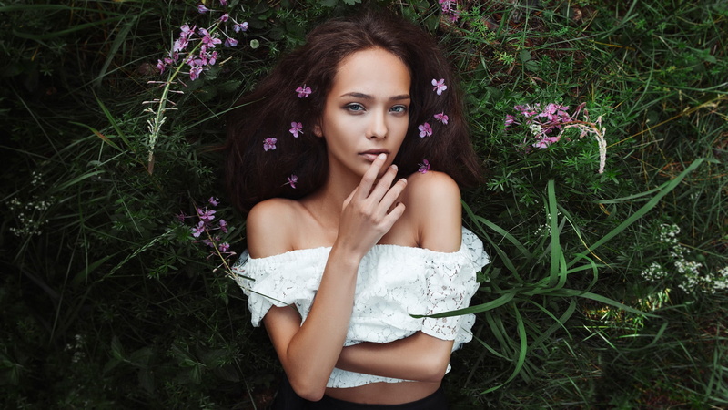 young adult, beauty, portrait, land, women, top, flowering plant, finger on lips, front view, looking at camera, outdoors, real people, blue eyes, young women