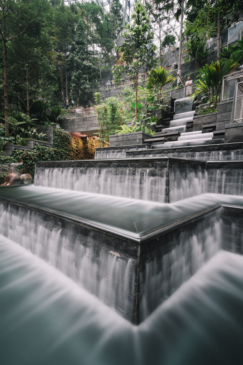 8K, slate, waterfront, beauty in nature, outdoors, canal, drinking fountain, person, waterfall, motion, rainforest, architecture, fern, day, scenics - nature