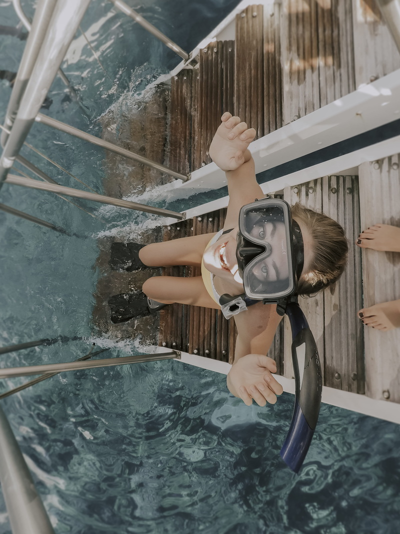 men, holding, 4K, apparel, maui, tub, snorkling, hot tub, young women, clothing, real people, one person, banister, human, person, sport, blue, snorkel