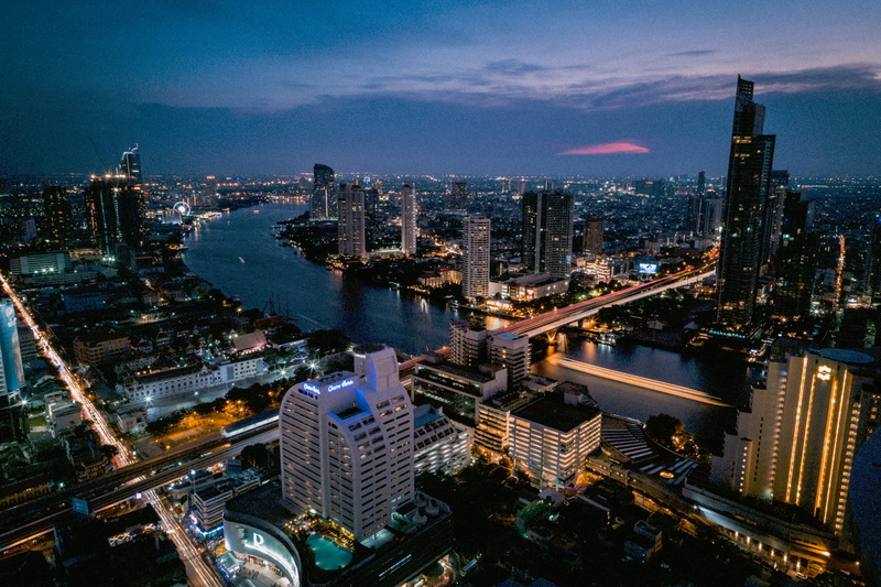 urban Scene, traffic, bangkok, skyscrapers, office building exterior, water, illuminated, outdoors, building Exterior, urban, high angle view, dusk, cloud - sky